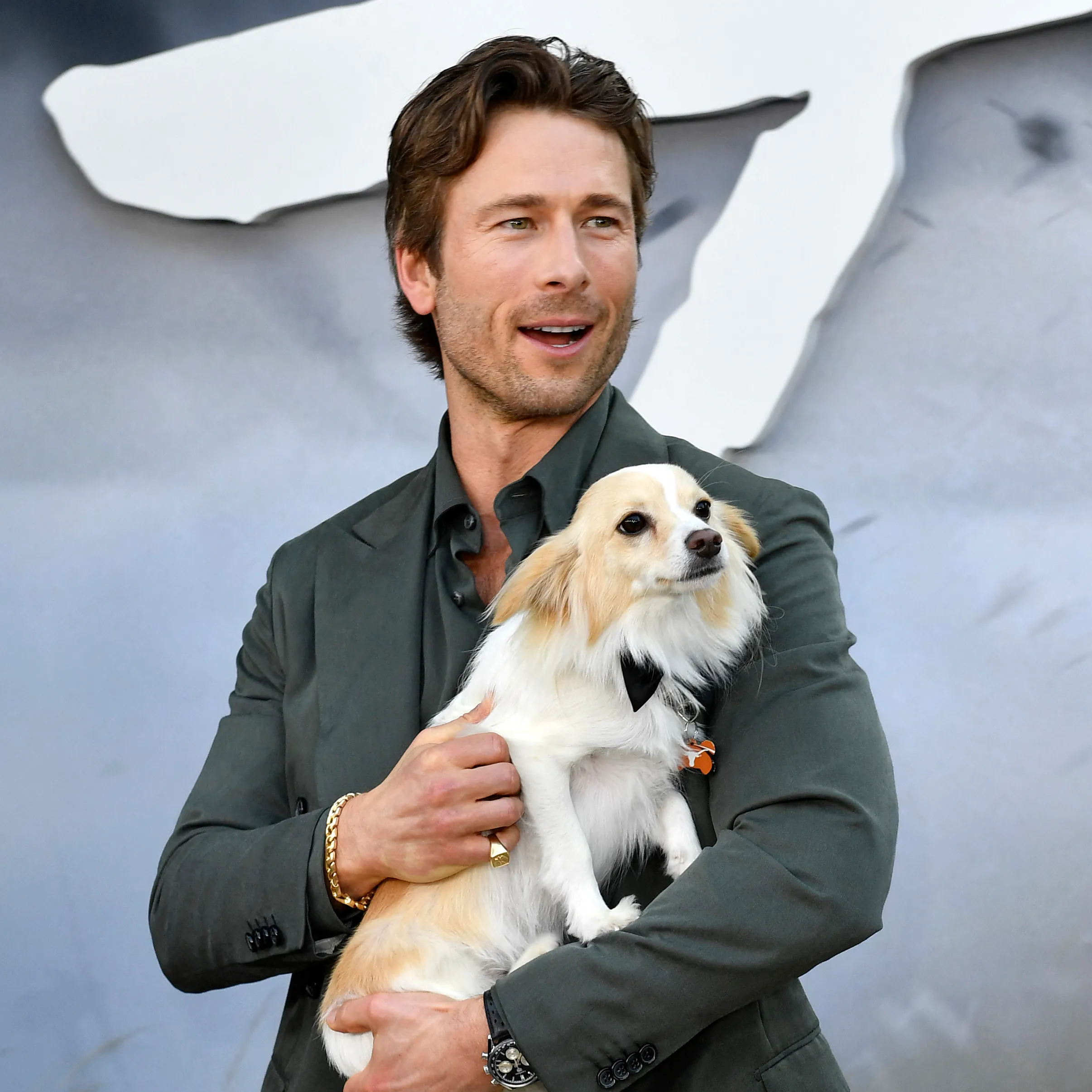 Glen Powell's Adoption of Rescue Puppy Brisket Boosts Both His Life and The Labelle Foundation