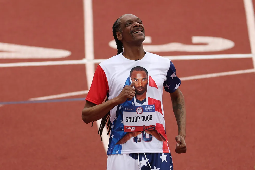 Snoop Dogg's Unique Role at the 2024 Paris Olympics: Torchbearer, Basketball Companion, and Cultural Connector